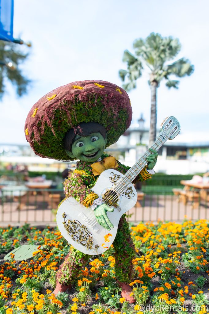 Topiary of Miguel from Disney's Coco located in the Mexican Pavilion.