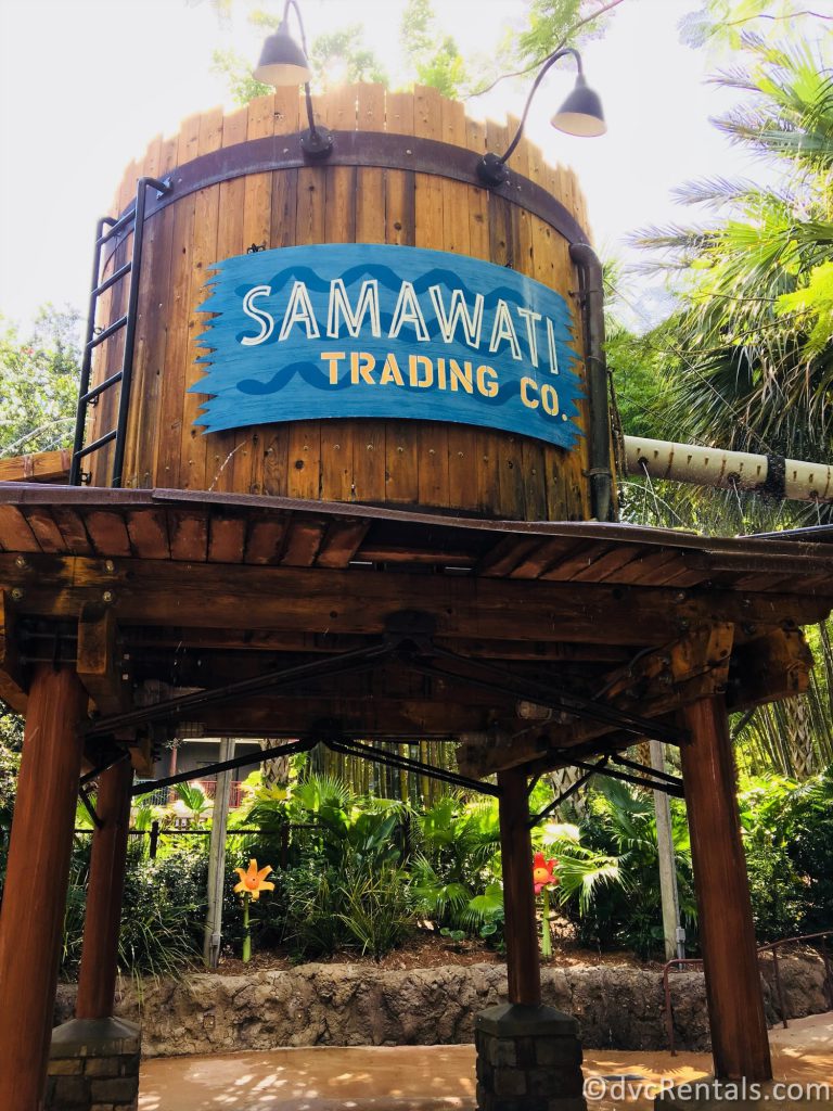 A large wooden water tower that reads Samwati Trading Co. found in the water play area at Disney's Animal Kingdom Villas, Kidani Village.