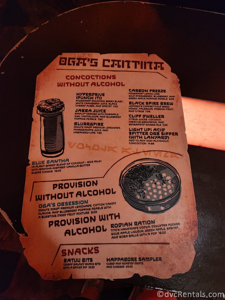 Oga's Cantina menu featuring both alcoholic and non-alcoholic beverages as well as snacks.