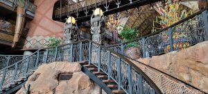 Staircase inside the lobby of Disney's Animal Kingdom Villas, Jambo House. The railings of the staircase feature patterns that look like animal patterns.