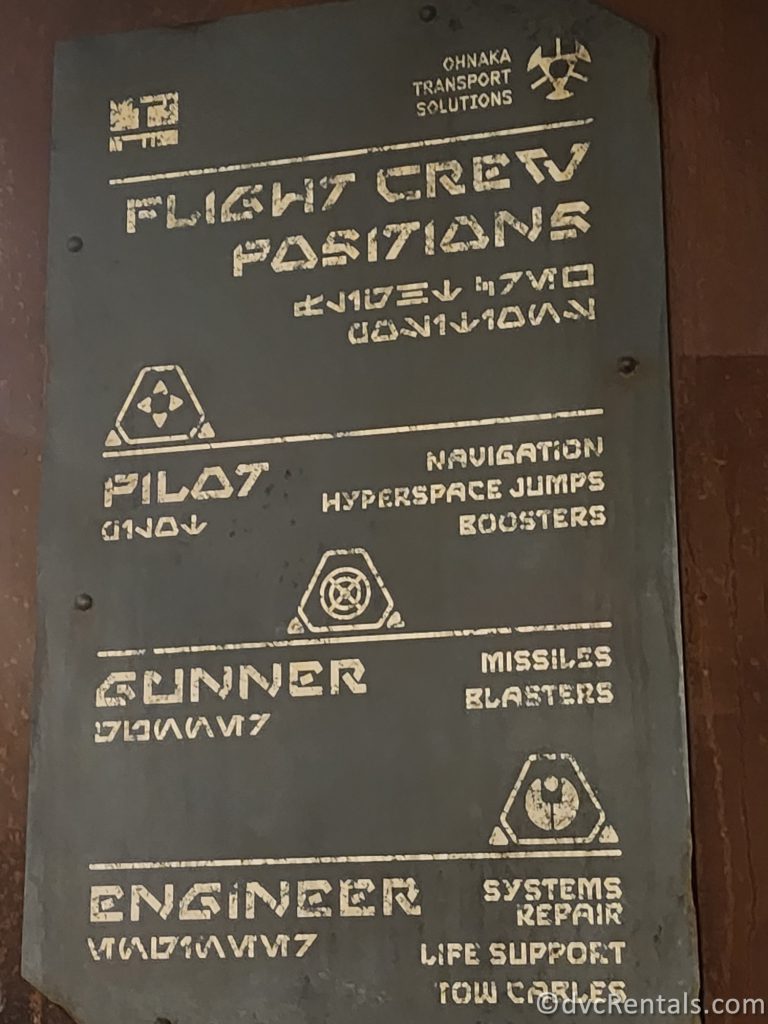 Sign in Millennium Falcon: Smugglers Run that outlines the three jobs: Pilot, Gunner, and Engineer.