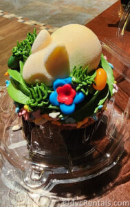 Seasonal Easter Cupcake from Roaring Forks at Disney's Wilderness Lodge. A white chocolate bunny sits on top of a chocolate cupcake covered in green icing.