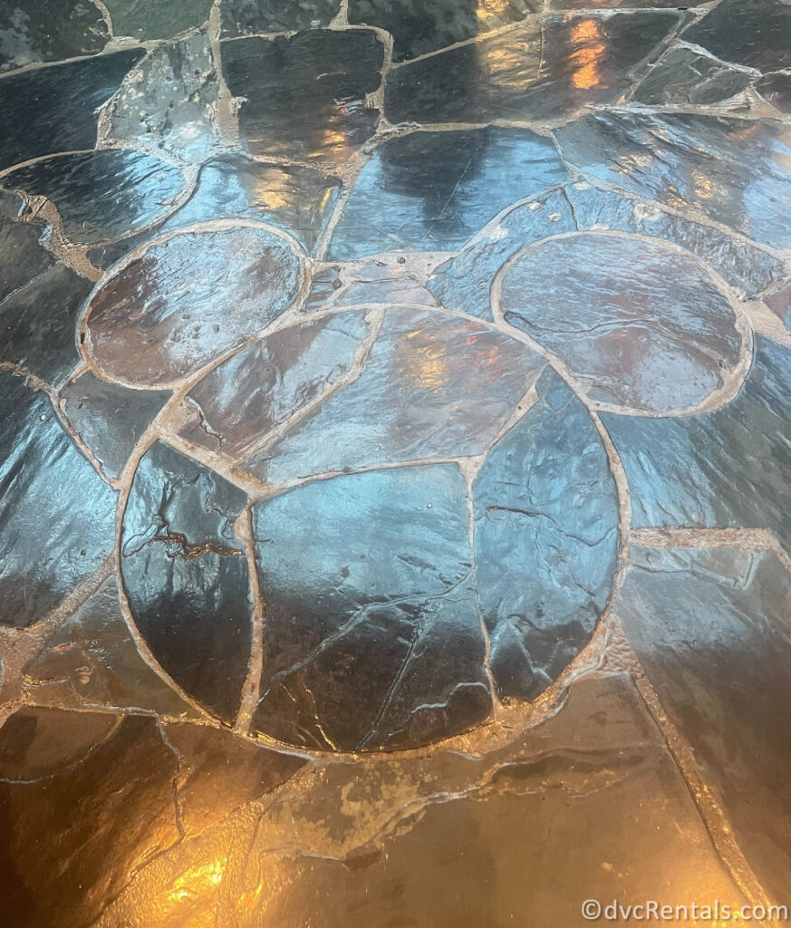 Hidden Mickey built into the tiles of the floor in the lobby at Disney's Polynesian Villas.