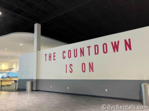 Billboard that reads "The Countdown is on" in the boarding area for Royal Caribbean in Port Canaveral.