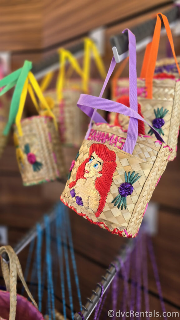 A close-up shot of a woven bag with Ariel woven into it.