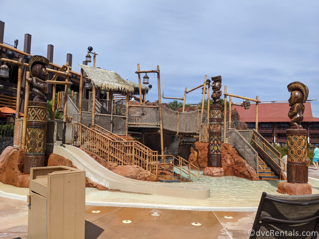 Tiki-themed water play area in the pool at Disney's Polynesian Villas.