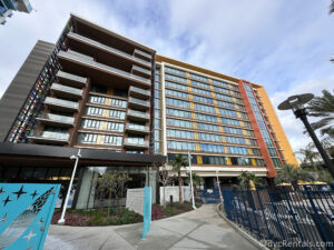 Exterior of the Villas at the Disneyland Hotel. The building is brown and orange.