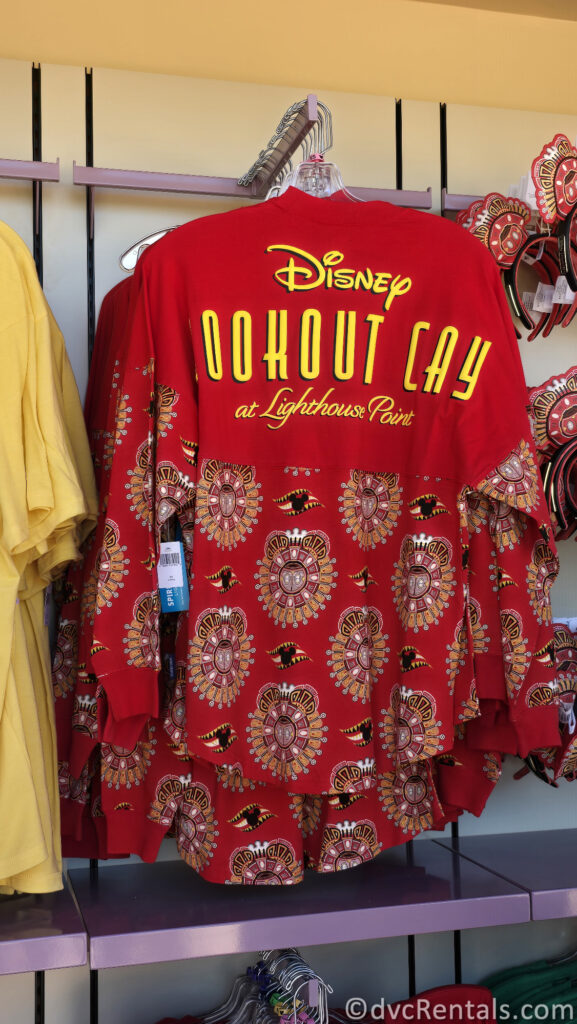 Red Spirit Jersey that reads "Lookout Cay at Lighthouse Point" across the back in yellow font.