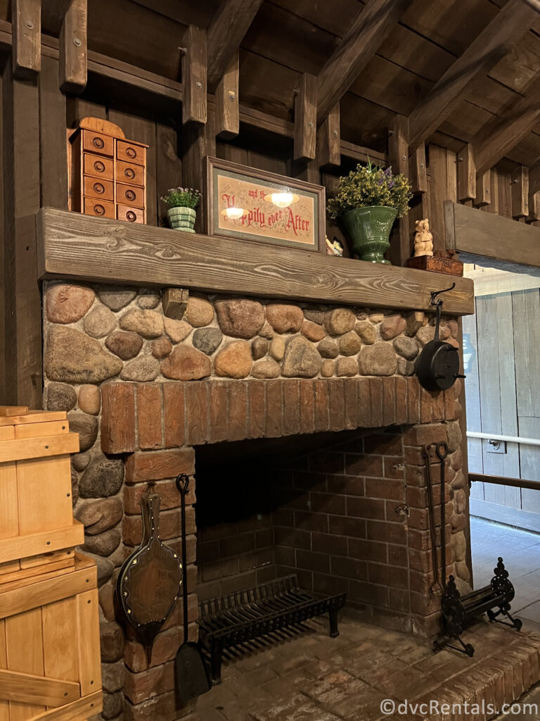 Fireplace covered in rocks in the queue of Tiana's Bayou Adventure.