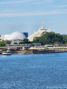 Space Mountain and TRON Lightcycle/Run in Magic Kingdom with the monorail running in front.