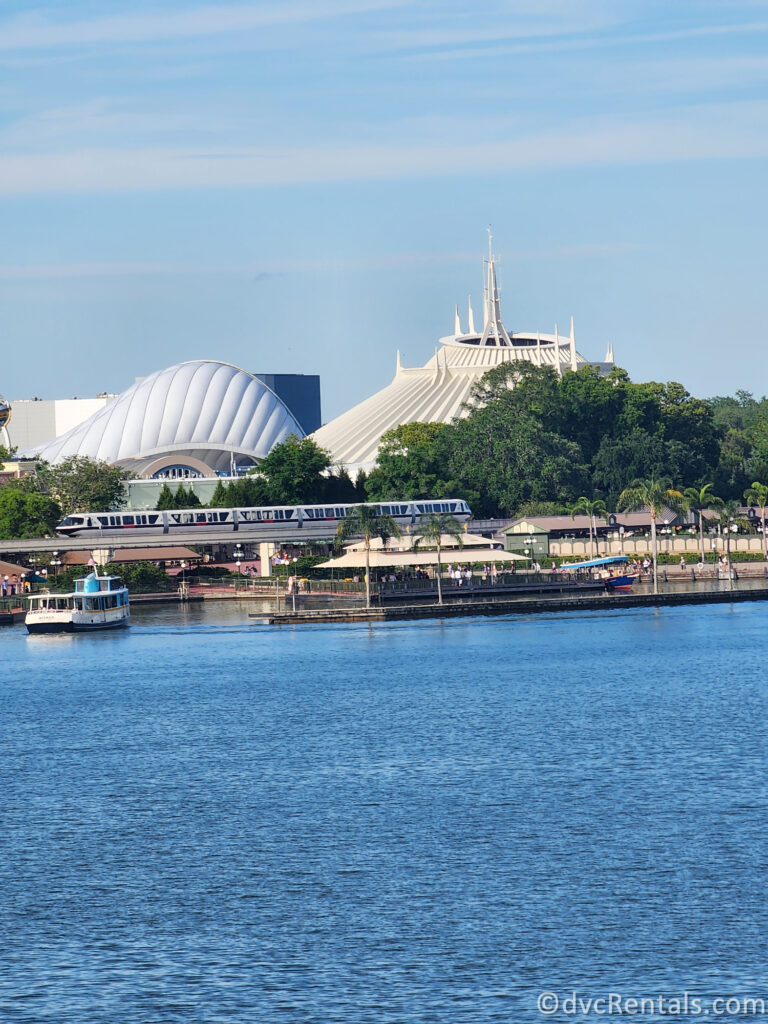 Space Mountain and TRON Lightcycle/Run in Magic Kingdom with the monorail running in front.