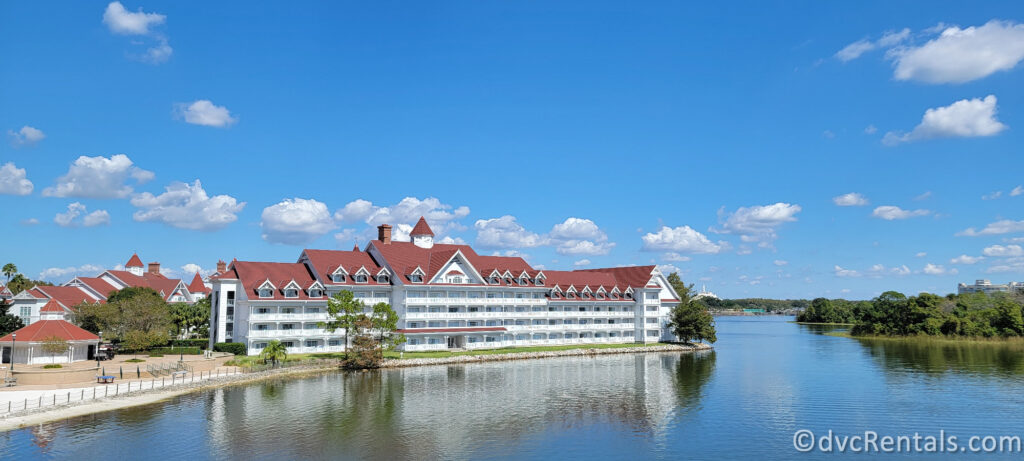 Disney's Grand Floridian Resort & Spa. The resort is a large, white building with red roofs and a prominent tower.