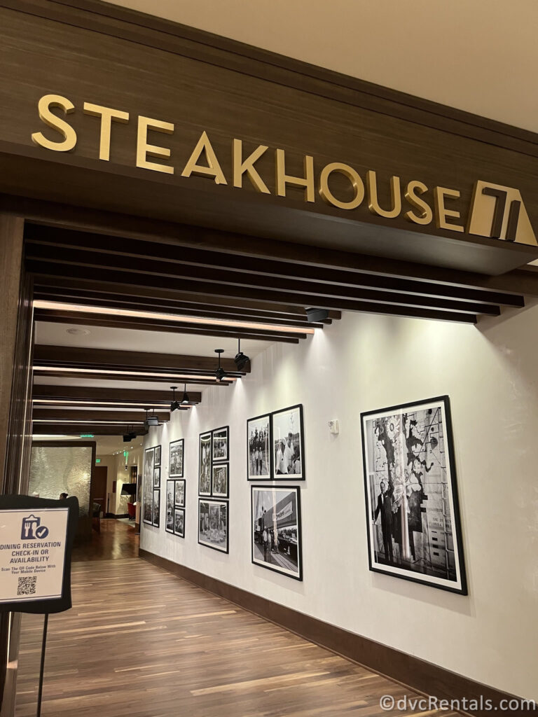 Entrance to Steakhouse 71. The restaurant sign is written in gold lettering on top of the dark wood exterior.