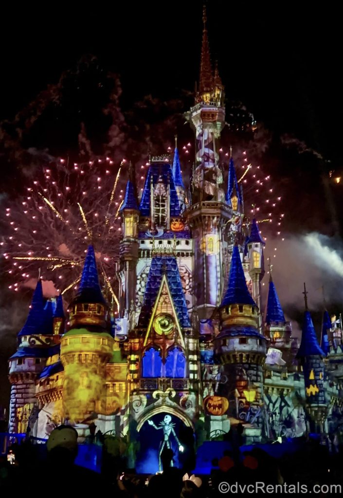 Jack Skellington performs in front of the fireworks during Disney’s Not-So-Spooky Spectacular ahead of Cinderella Castle at Magic Kingdom. Projections illuminate the castle with Halloween images.