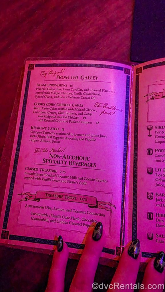 A page of The Beak and Barrel menu is shown. Displayed are the selections “From the Galley” and “Non-Alcoholic Speciality Beverages” for small bites and mocktails.