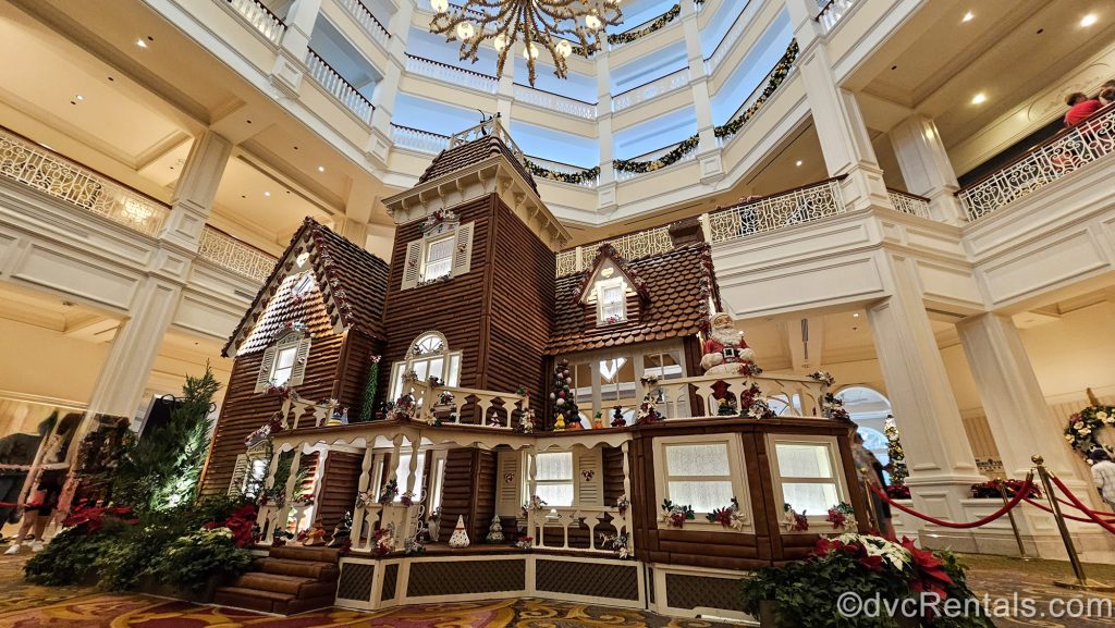 A life-size gingerbread house decorated for the holidays is on display in the main lobby of Disney’s Grand Floridian Resort & Spa.