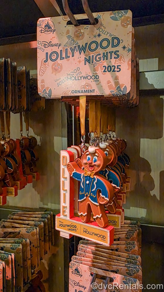 An ornament featuring Ollie the jolly gingerbread man standing next to a sign of his name is displayed for sale during Disney Jollywood Nights at Disney’s Hollywood Studios.