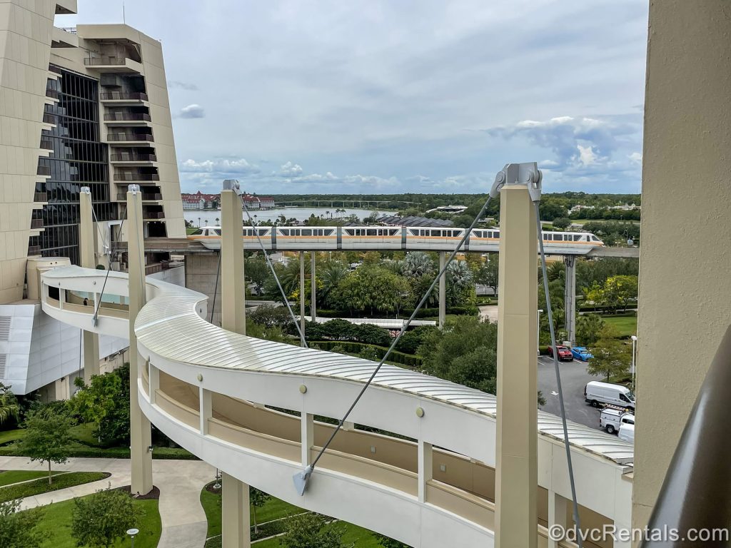 The monorail travels into the station at Disney’s Contemporary Resort, as seen from a balcony at Bay Lake Tower.