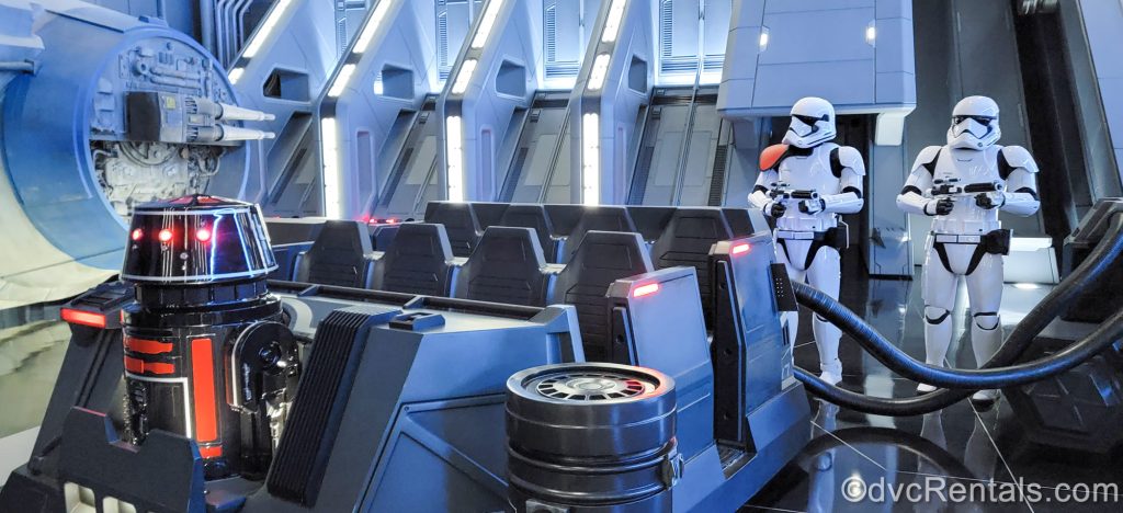 Two Stormtroopers are seen next to a ride vehicle in a sequence from the Rise of the Resistance attraction at Disney’s Hollywood Studios Theme Park.
