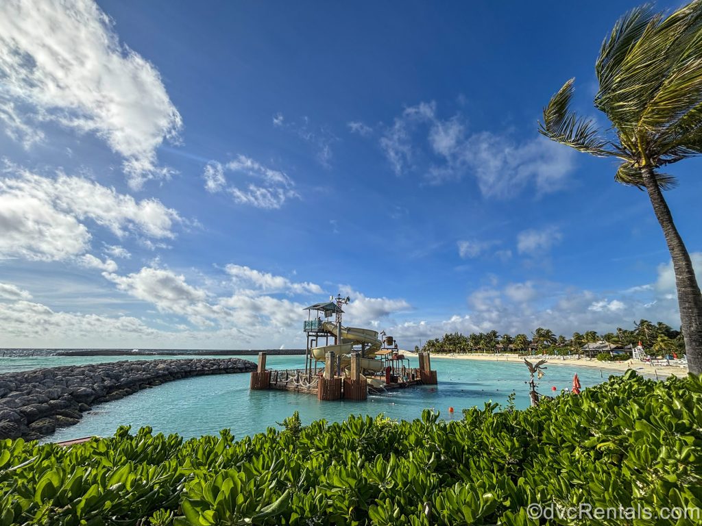 The Pelican Plunge waterslide platform is seen under a sunny sky at Disney Castaway Cay in the Bahamas.