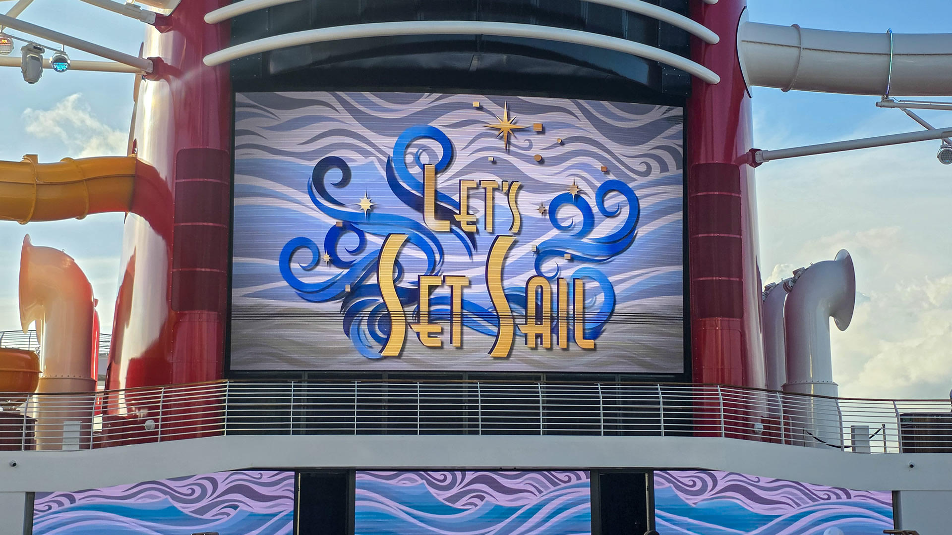 The Funnel screen of the Disney Destiny displays the words “Let’s Set Sail” in yellow writing with blue wave-inspired accents.