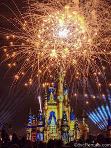 Golden fireworks sparkle over Cinderella Castle during the Happily Ever After fireworks at Magic Kingdom.