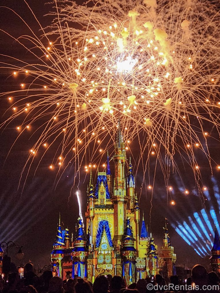 Golden fireworks sparkle over Cinderella Castle during the Happily Ever After fireworks at Magic Kingdom.