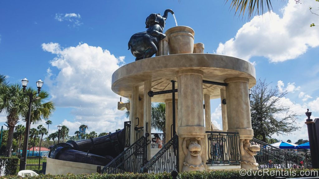 The Fantasia-inspired S’il Vous Play water play area for kids at Disney’s Riviera Resort is seen under a sunny sky.