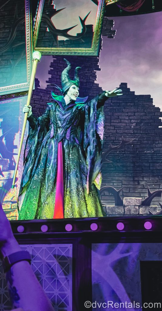 Maleficent from Sleeping Beauty performs on stage during the Villains Unfairly Ever After show at Hollywood Studios.