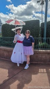 David’s Vacation Club Rentals team member Elyse poses with Mary Poppins during a sunny day at Hollywood Studios.
