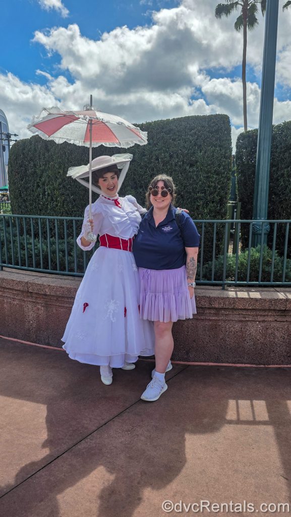 David’s Vacation Club Rentals team member Elyse poses with Mary Poppins during a sunny day at Hollywood Studios.