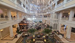 Guests enjoy the Victorian-inspired décor and amenities in the main lobby of Disney’s Grand Floridian Resort & Spa.