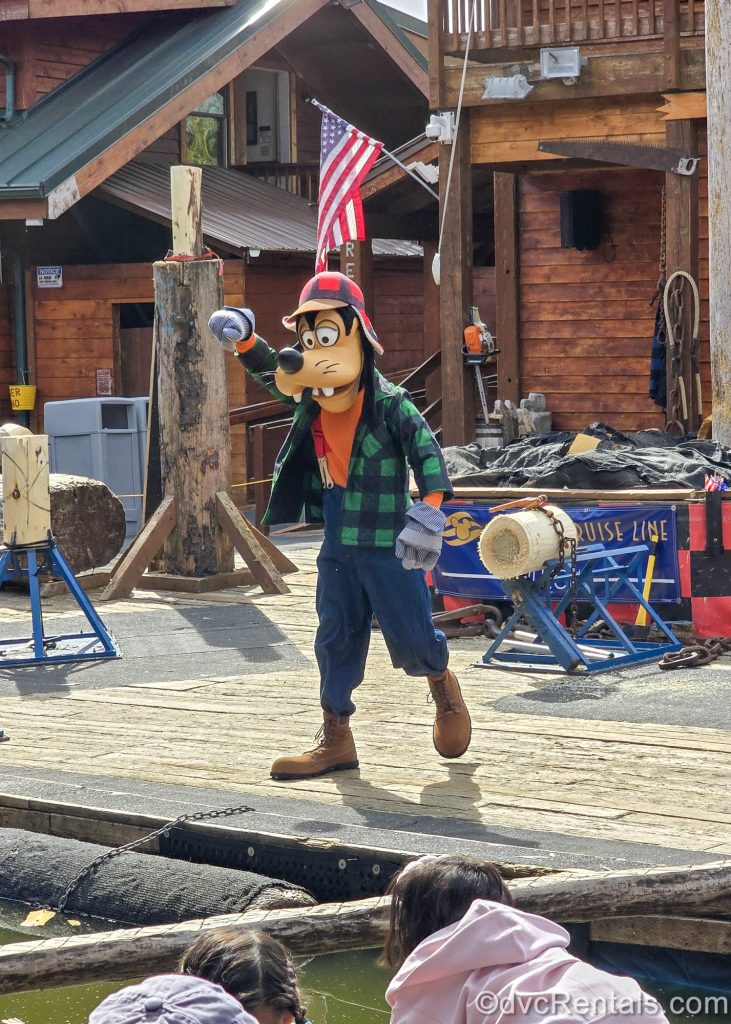 Lumberjack Goofy leads kids in activities exclusive to Disney Cruise Line guests as they await the start of the Great Alaskan Lumberjack Show in Ketchikan, Alaska.