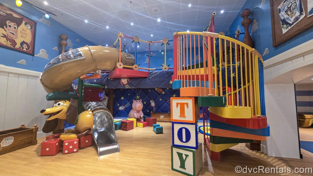 haracters from the Toy Story films are seen in the décor and play areas of the Andy’s Room section of Disney’s Oceaneer Club for kids onboard the Disney Magic.