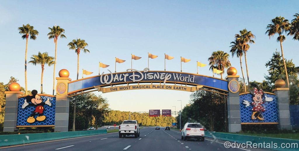 A photo of the Walt Disney World sign on the highway