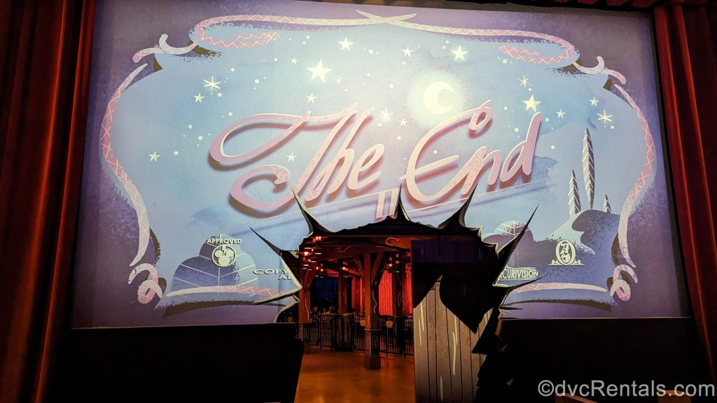 Pink cursive script reading “The End” is seen on screen as guests exit Mickey & Minnie’s Runaway Railway attraction.