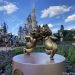 Chip and Dale Gold statues with Cinderella Castle in the background